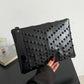 Stud Me Out Staple Clutch